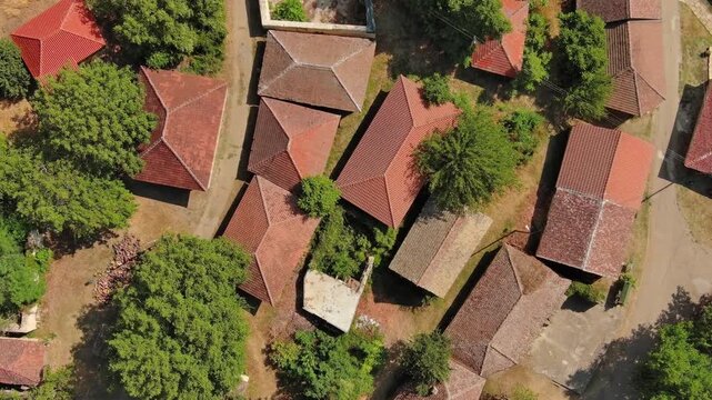 Aerial top view of old rustic vintage houses with wine cellars in Rogljevacke pivnice in Negotin region of Serbia, 4k