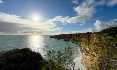 Obraz premium Pau Beach (Praia do Pau) is just east of the renowned Marinha Beach and is only accessible by sea as it is surrounded by coastal cliffs.