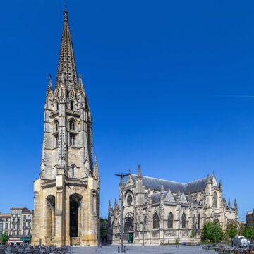 Side view of Basilica of Saint Michael and its detached bell tower in Bordeaux, France. Square composition in bright daylight