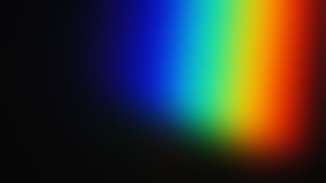 Prism reflection projects a vivid spectrum of blue, green, yellow, and red hues.