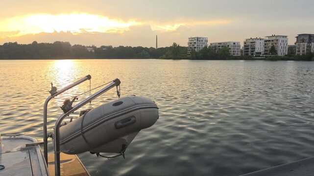 Inflatable dinghy mounted on boat at Ziegelinnensee in Schwerin