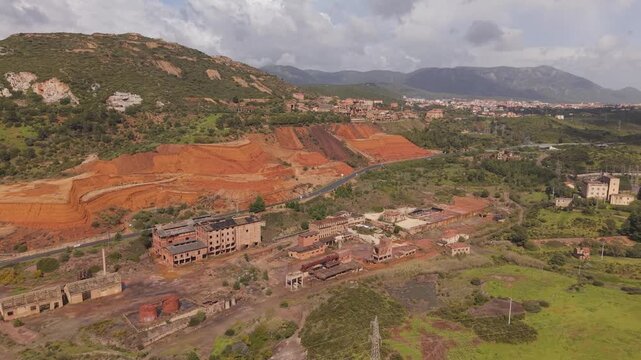 Historic Lead, Zinc, And Silver Mining Complex Of Monteponi Mine In Iglesias, South Sardinia, Italy. Aerial Drone Shot