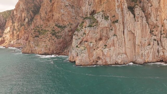 Porto Flavia 20th-century Industrial Mining Harbor Near Masua In Southwestern Sardinia, Italy, Carved Into The Coastal Limestone Cliffs. Aerial Shot