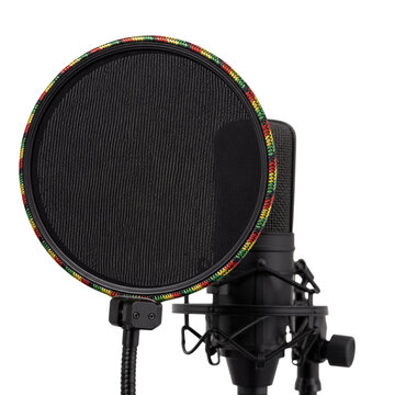 Professional studio microphone with reggae colored pop filter isolated on transparent background PNG element