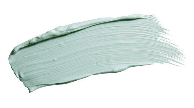 Thick mint green cosmetic cream smear with visible brush strokes, isolated on transparent background