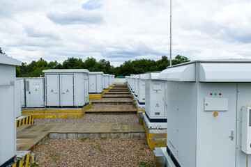 Naklejka premium Aerial view of container‑type battery energy storage station and high‑voltage substation