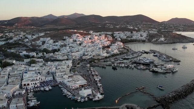 Aerial view of Naoussa port at dusk on Paros island in Greece.