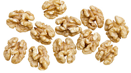 Fototapeta premium Scattered raw walnut halves natural texture, isolated on transparent background