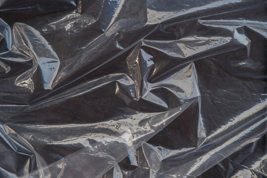 Crumpled Plastic Wrap Texture Overlay Background for Packaging Mockup and Graphic Design