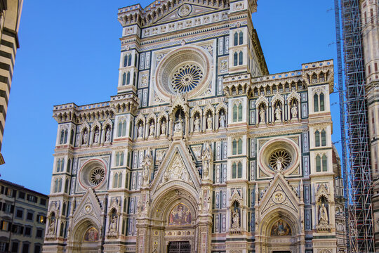 Ornate Marble Facade of Florence Cathedral Santa Maria del Fiore at Twilight, Renaissance Architecture Landmark in Tuscany, Italy with Rose Window