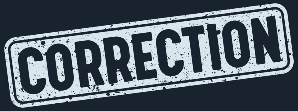 correction stamp. correction white rectangular grunge stamp on dark blue background