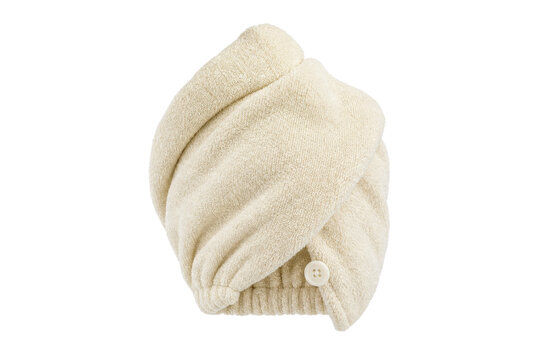 Soft beige microfiber hair towel wrap with a button closure, designed for quick drying, isolated on a clean white background