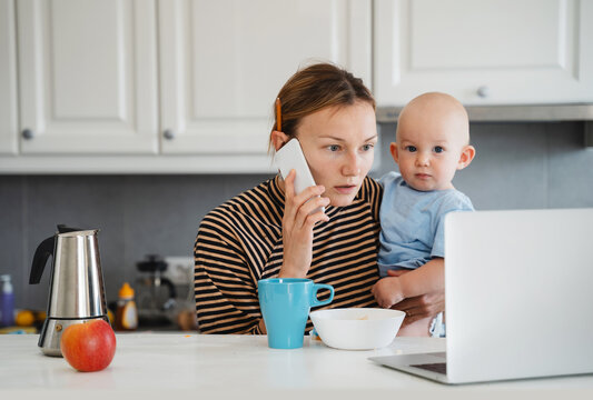 Mother balancing between work and baby on sick or maternity leave.