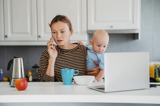 Mother balancing between work and baby on sick or maternity leave.