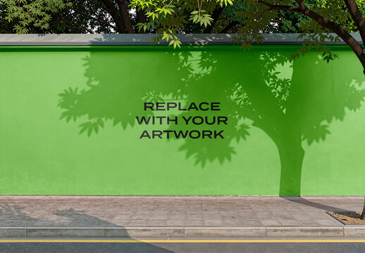 Vertical wall mockup with tree shadow and text overlay, outdoor urban environment featuring paved sidewalk street, realistic art display template for branding advertising in public space
