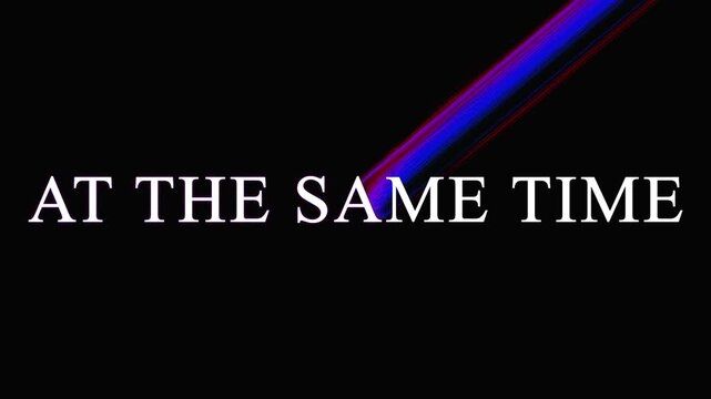 Text overlays showing AT THE SAME TIME with digital glitch effects across a dark background during a cinematic sequence