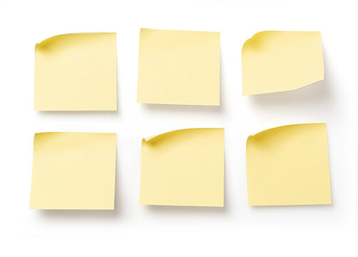 Yellow blank sticky notes creating reminders and messages
