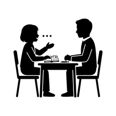 Fototapeta premium Silhouette of student and teacher talking at a desk