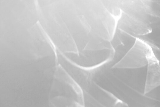 Real dense caustic ripple shadow cut out on a transparent png background with soft diffused wavy edges. Lives in a serene wellness scene overlay, surreal and psychedelic design as a transparent png.
