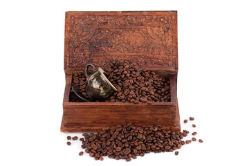 Roasted coffee beans and a cup in a wooden box. © kuzina1964