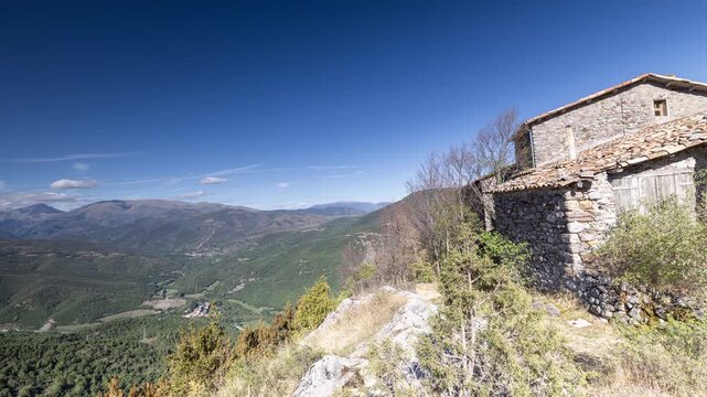 house and mountain landscape near the small village of cervoles in spain