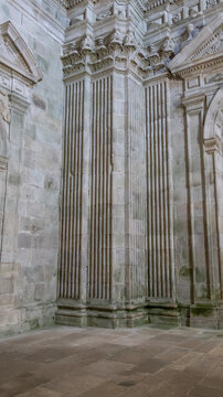 Granite pilasters with capitals inside a historic monastery