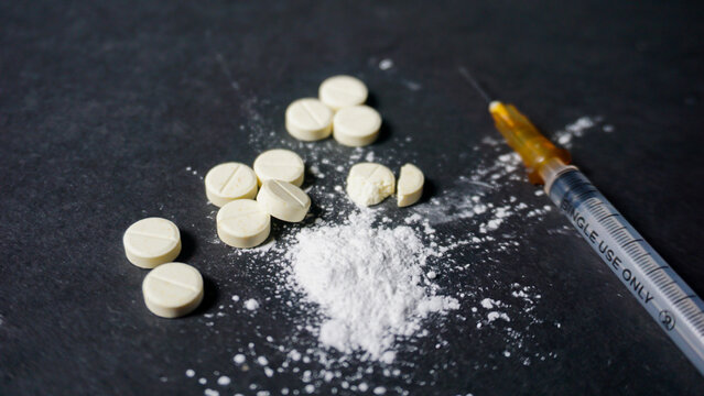 drugs and syringe. Misused drugs concept. 