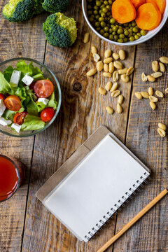 concept diet, slimming plan with vegetables top view mock up