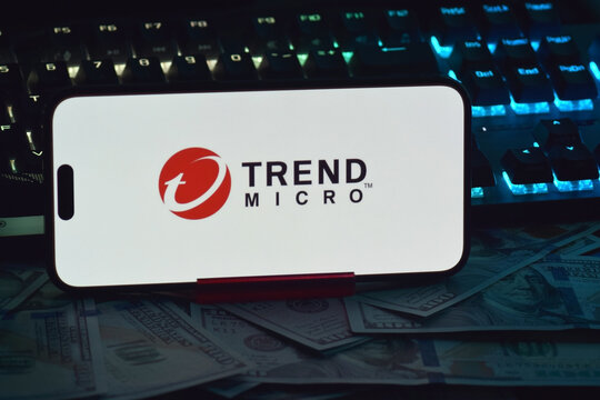 On a mobile phone screen logo Trend micro Corp global computer security software company.