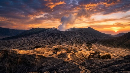 Sunrise view of Mount Bromo volcano in Indonesia with smoking crater. © zaras