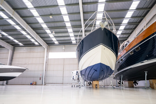 luxury motor yachts in a storage