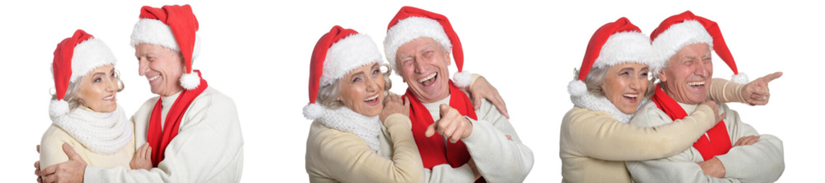 Happy Senior Couple in Santa Hats Celebrating Christmas Together