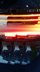 Close-up of Modern Car Tail Light at Night © nana