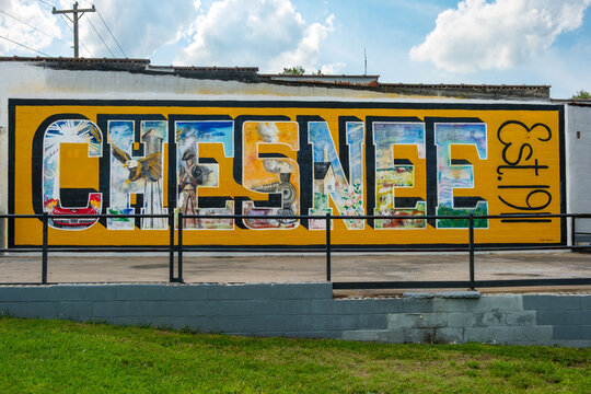 Chesnee South Carolina Mural on Yellow Brick Wall with Historical Imagery