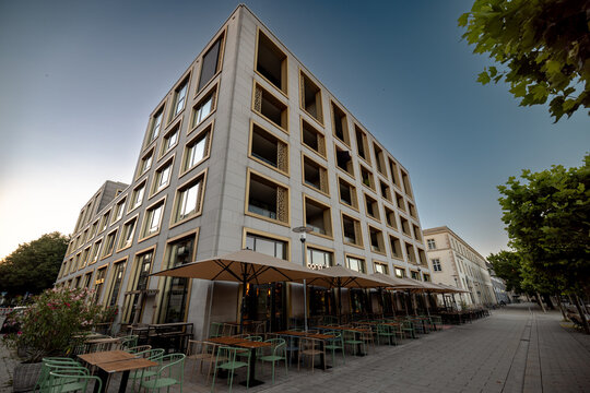 Hanover, Germany - July 2, 2026: Contemporary mixed-use building with repetitive square window bays stands in Hanover city centre.