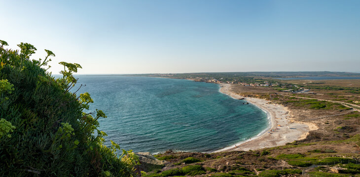 Panorama of the San Giovanni in Sinis promontory, sea view at sunset, in the municipality of Cabras, Italy.