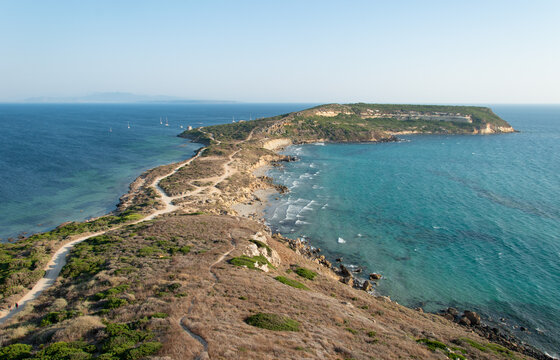 Panorama of the San Giovanni in Sinis promontory, sea view at sunset, in the municipality of Cabras, Italy.