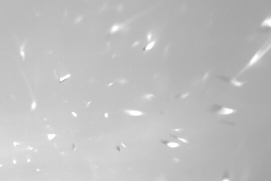 Real scattered abstract shadow cut out on a transparent png background with soft bokeh-like flecks. Suits an airy beauty mockup overlay, a dreamlike jewelry and ethereal beauty branding as a png.