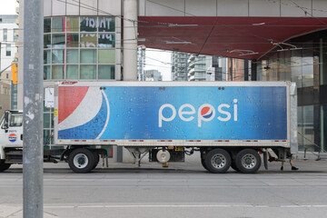 Obraz premium big delivery truck with Pepsi branding on Victoria St near Sankofa Square, Toronto