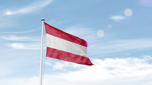 Austria national flag waving in sky.