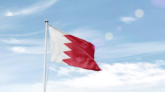 Bahrain national flag waving in sky.