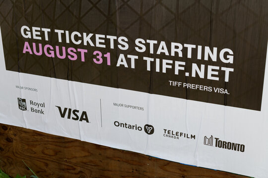 detail of a wheatpaste poster on a construction plywood hoarding in Toronto (TIFF, Toronto International Film Festival, 10-20 September 2026)