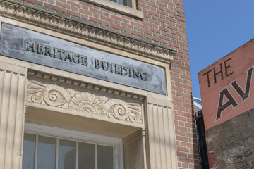Obraz premium historic building at 224 Davenport Rd (Canada Bread Building) and part of old sign at Avenue Diner (222 Davenport Rd), Toronto