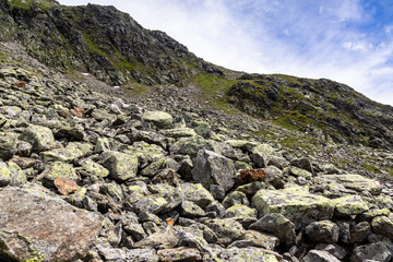 Obraz premium Mountain scree slope and rocky alpine terrain, Austria, Tyrol, Pitztal, Mittelberg, 29 June 2026