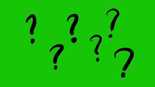 Multiple hand drawn black question marks appearing on green screen background for chroma key compositing