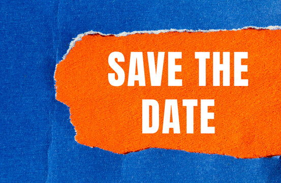 Save the date message written on ripped torn paper background. Conceptual Save the date symbol. Copy space.