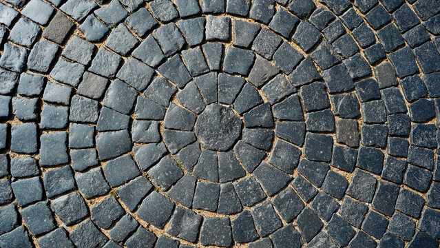 Texture of paving stones in circular pattern radiating from center