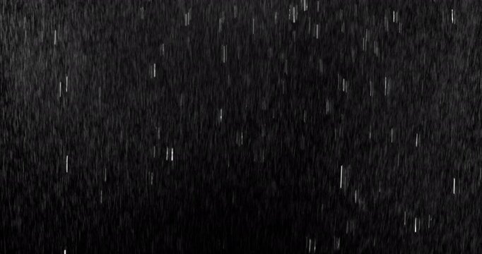 Realistic motion blurred rain streaks falling on a black background creating a natural weather VFX overlay ideal for compositing visual effects digital artwork atmospheric scenes and graphic design