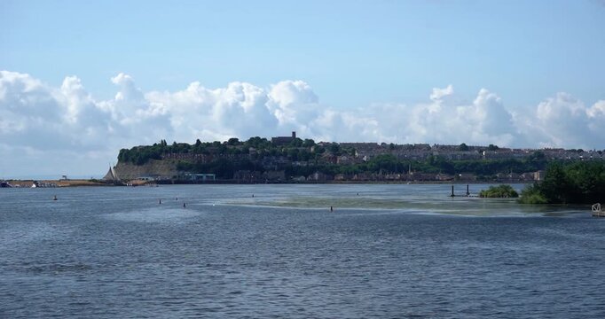 Cardiff Bay waterfront and distant buildings in Wales