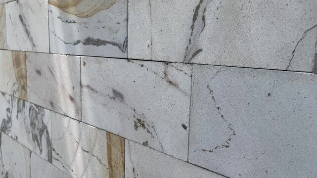 Luxury granite block wall background b roll clip for real estate promo